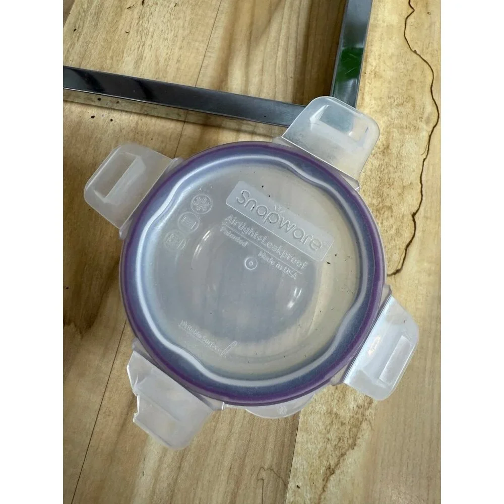 Snapware purple plastic lid with glass ware
